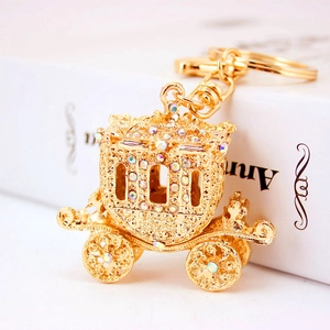 Golden alloy pumpkin carriage keychain with sparkling rhinestones for car keys and bags