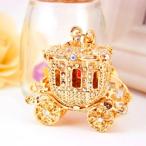 Elegant gold rhinestone pumpkin carriage keychain with sparkling crystals for bags