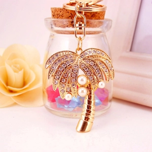 Creative gold coconut tree keychain with sparkling rhinestones and elegant pearls
