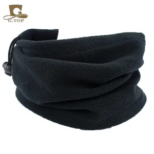 Detail of black fleece neck gaiter featuring an adjustable drawstring and plastic toggle cord