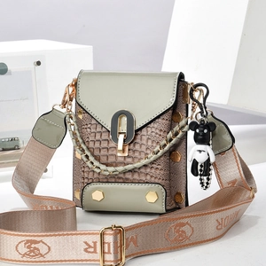Green patent leather and crocodile texture crossbody bag with wide jacquard strap