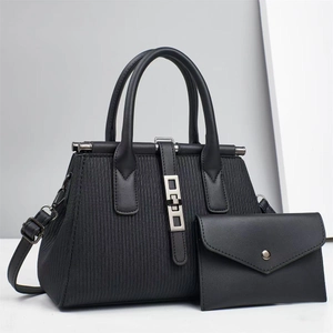 Elegant black textured handbag set with pleated finish and silver geometric metal buckle