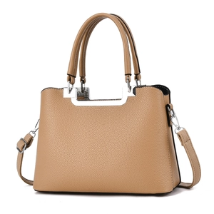 Elegant khaki lychee grain leather tote bag with silver metal handle bar and shoulder strap