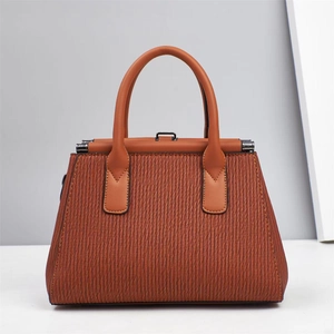 Brown wood-textured tote bag for women with dual handles and elegant metal clasp