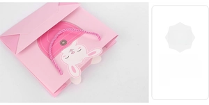 Sac cadeau rose motif lapin avec poignées en corde torsadée et design mignon