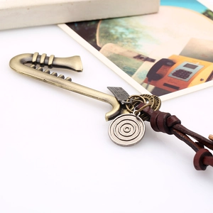 Vintage bronze key pendant necklace with brown leather cord and handmade metal tag