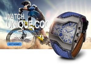Oulm mens dual time watch with brushed metal case and blue snakeskin texture strap