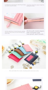 Detail of leather card holder featuring 4 slots, metal zipper, and retractable strap