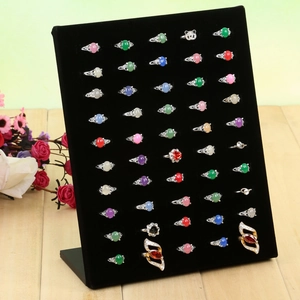 L-shaped black velvet jewelry display stand featuring 50 slots for various gemstone rings