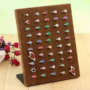 L-shaped 50-slot velvet ring display stand with assorted colorful gemstone rings
