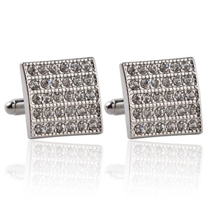 Detail of silver plated square cufflinks for men featuring multiple rows of clear zircon stones