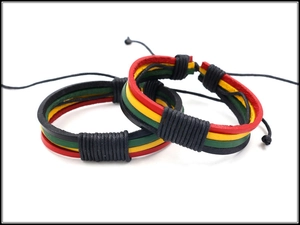 Detail of multi-layer hand-woven leather bracelets in Jamaica reggae red yellow green colors