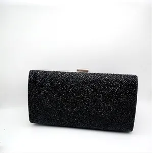 Elegant black evening clutch bag with full rhinestones and silver metal clasp closure
