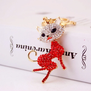 Portachiavi gatto scintillante con corona dorata e strass rossi eleganti
