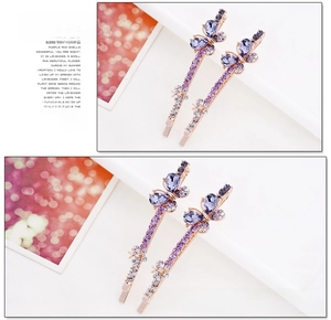 Detail of rose gold butterfly hair clip with deep purple and white rhinestones inlay
