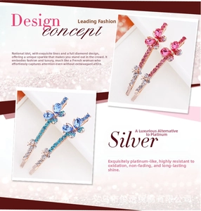 Detailed view of pink and blue butterfly hair clips with sparkling rhinestone inlay