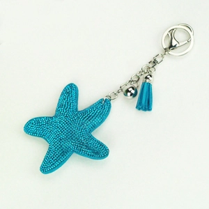 Blue starfish keychain with sparkling rhinestones, matching tassel and silver metal ring