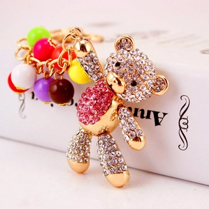 Golden rhinestone teddy bear keychain with colorful beads for handbags and car keys