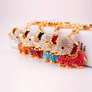Cute cartoon elephant keychains with colorful rhinestones on gold metal base in four colors