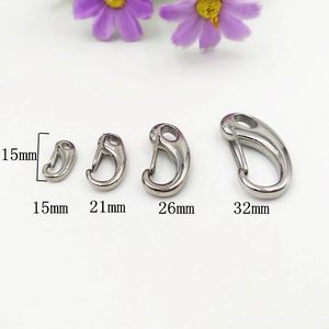 Macro detail of silver stainless steel lobster clasps in 15mm to 32mm sizes