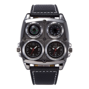 Detailed view of dual time zone watch with compass and thermometer on leather strap