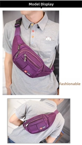 Detail of purple nylon waist bag with multiple zipper compartments and adjustable strap