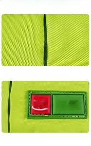 Detailed macro view of fluorescent green waterproof oxford fabric and embroidered logo
