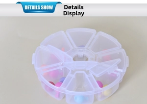 Detail view of round 8-compartment clear plastic storage box for beads and small craft items