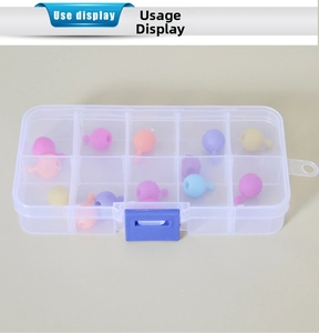 Top view of 10-compartment transparent organizer box with blue latches and colorful beads