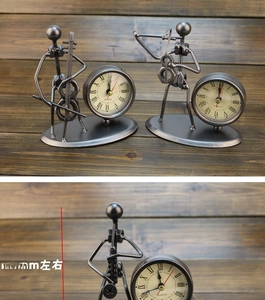 Detail shot of vintage iron musician desk clock with 13.5cm height measurement