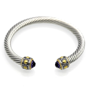 Silver twisted cable cuff bracelet with gold accents and purple triangular gemstones