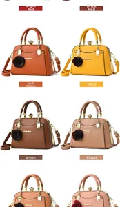 Detail view of multi-color retro doctor bags with decorative rose charms and metal frames