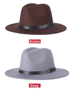 Close-up of classic wool jazz fedora hats in coffee and grey with leather belts