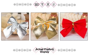 Detail view of red flocked and metallic gold silver Christmas bows for tree decoration