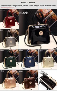 Detailed view showing the interior layout and high-gloss patent leather texture of the handbag