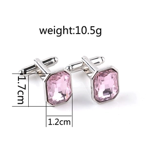 Detail view of pink crystal cufflinks with silver base and precise size measurements