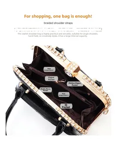 Detailed interior of black patent leather bag with multiple compartments and gold clasp