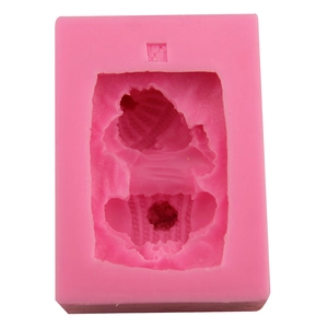 Pink silicone mold for handmade baby-shaped soap with detailed sleeping infant design