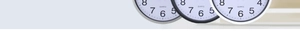 Detailed view of 12-inch quartz wall clocks in black, white, and silver plastic frames