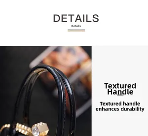 Detail of glossy black patent leather handbag handle with sparkling rhinestone ornament