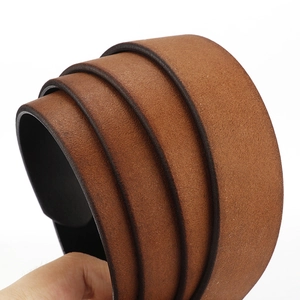 Detailed close-up of dark brown matte leather belt showing thick texture and edge finish