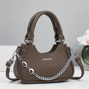 Brown lychee texture crossbody handbag with silver moon chain and fashion print