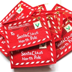Detailed embroidery on red felt Christmas envelopes for Santa decorations and candy holders