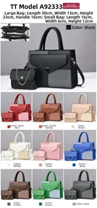 Detail view of stylish two-piece handbag set featuring textured panels and metal decor