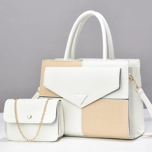 White leather tote bag with khaki straw patchwork and matching chain strap crossbody bag