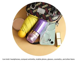 Top view detail of the shell bag interior capacity showing daily essentials and accessories