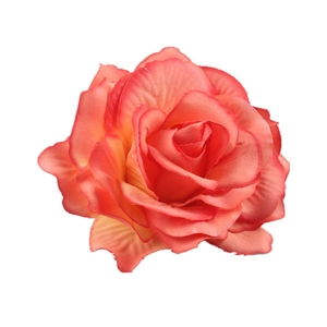Detail showing layers of coral pink silk rose petals for bohemian bridal hair accessories