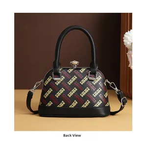 Rear view of high-capacity black Boston bag with gold and red geometric patterns