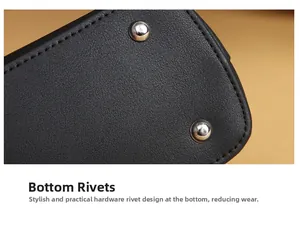Detail of lychee pattern leather handbag base with protective silver metal studs