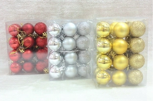 Detail of 3cm Christmas ball set showing red, gold, and silver shiny and matte finishes